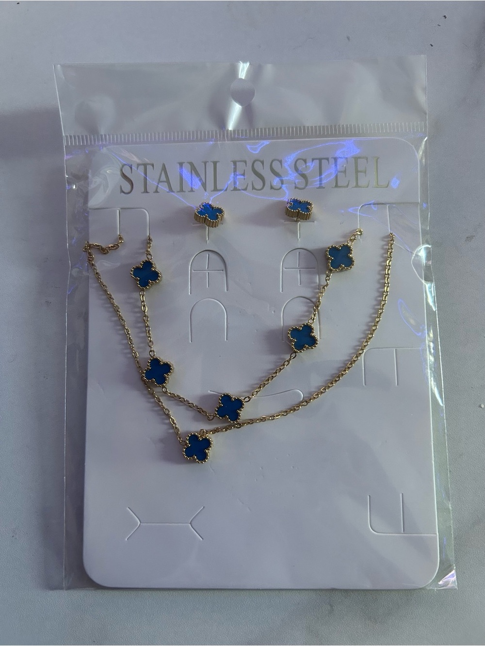 & Other Stories Gold-Tone Necklace and Stud Earrings with Blue Clover Charms